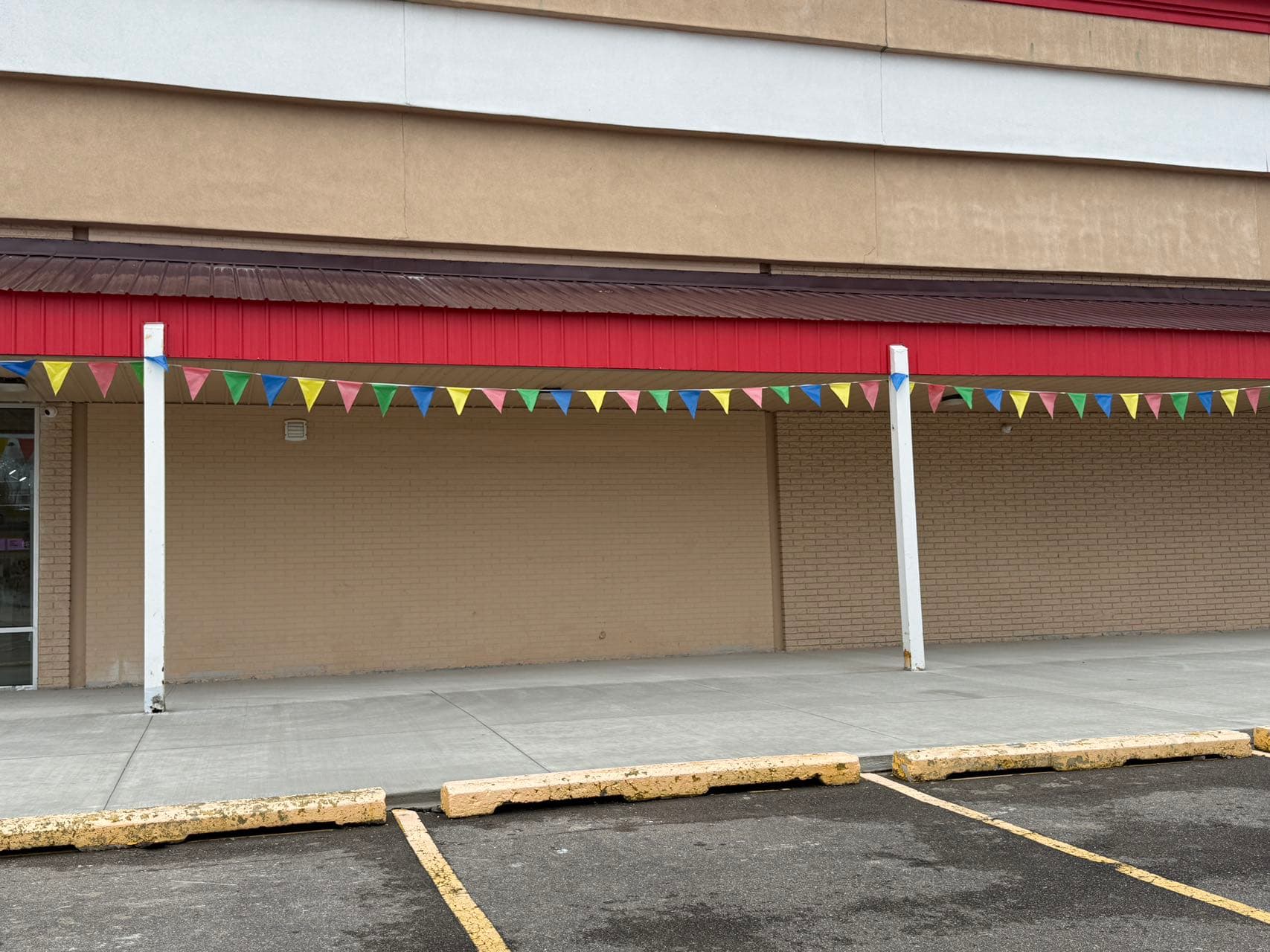 The exterior wall of AsianPlaza where the winning mural will be installed